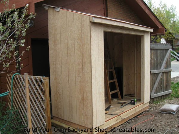 siding installed around shed door